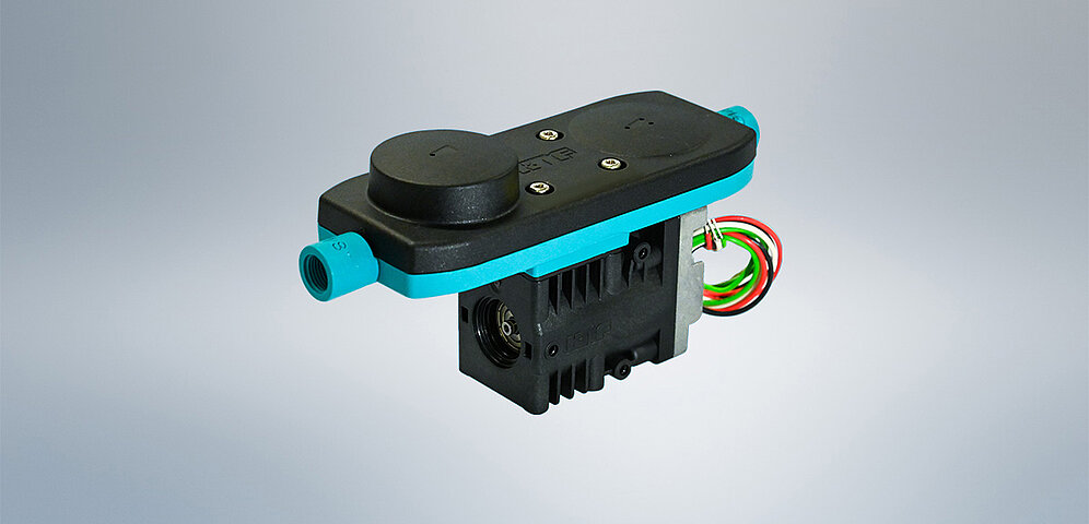 KNF NPK 02 swing piston pump on a grey background